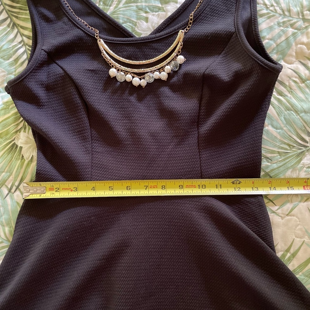 Black skater dress with criss-cross cutout on back - Picture 5 of 5